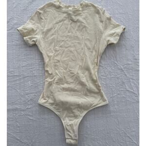 Skims | cream light yellow cotton jersey t-shirt tee shirt thong bodysuit  | XS